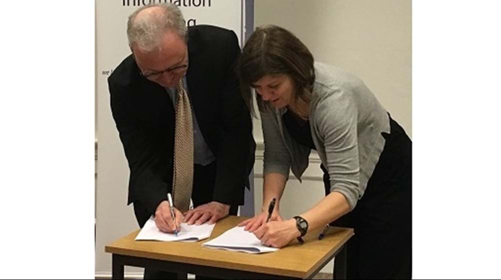 Lord Advocate James Wolffe and Sandy Brindley sign MOU