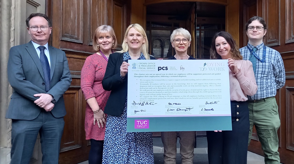 COPFS leaders and union representatives outside Crown Office with the signed charter